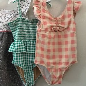 Two little girls bathing suits size 4t and 5.